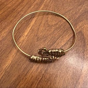 Gold seahorse wrap around bangle